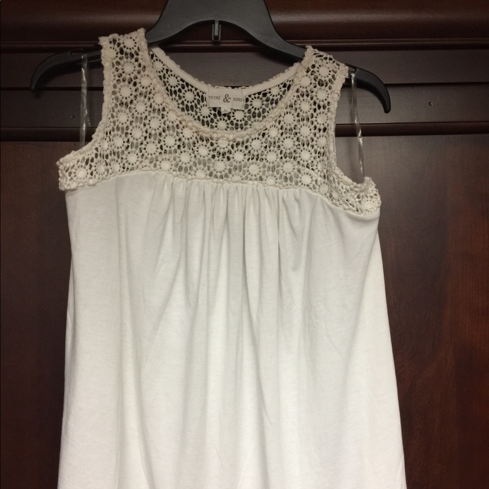 Cute white baby doll tank top with lace detail